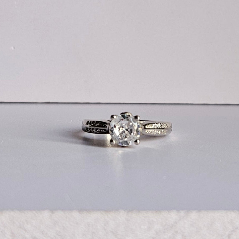 Maria Solitaire four prong Silver Ring